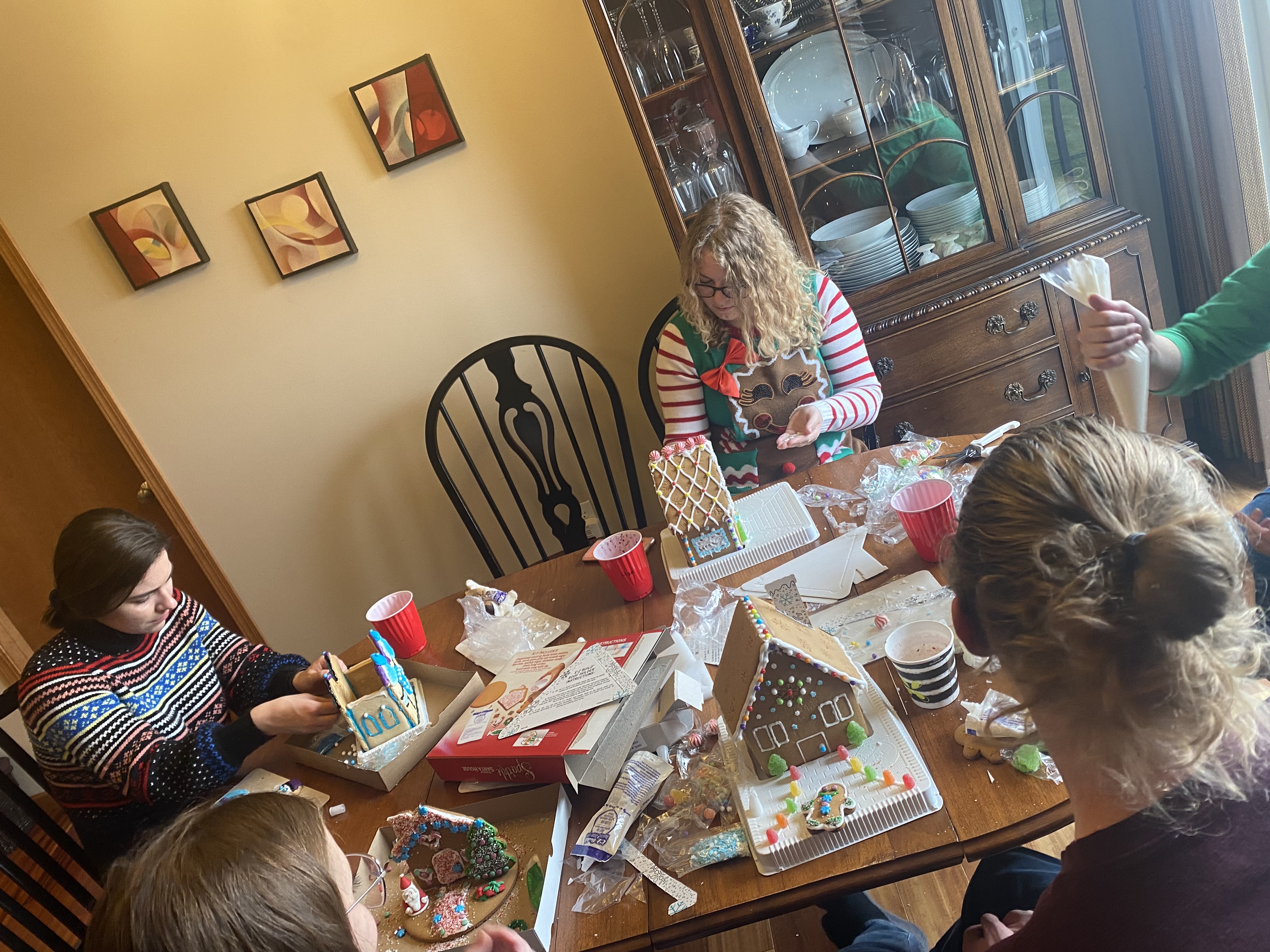 Cole group members making their gingerbread houses
