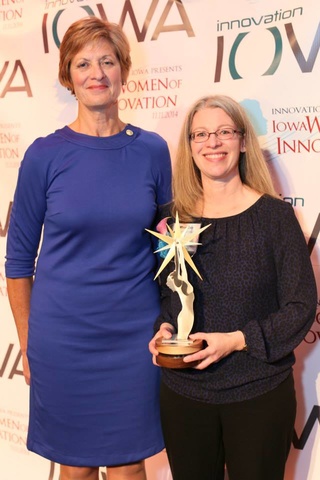 Dr. Cole being awarded the Iowa Women of Innovation Award for Academic Innovation & Leadership (Post-Secondary)57
