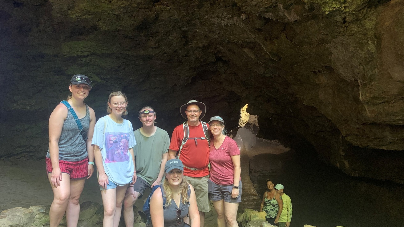 Whole group photo outside of the cave